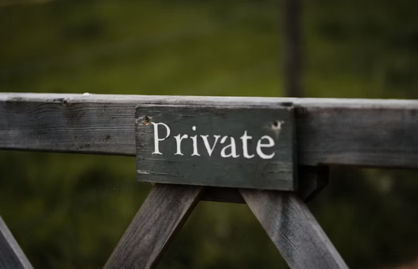 Private sign on gate